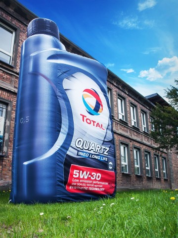 A bottle of Total Quartz motor oil