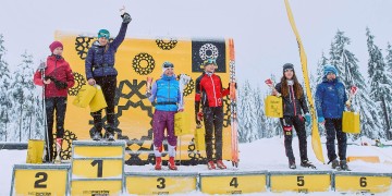 Advertising screen as a decorative wall during the cross-country skiing competition.