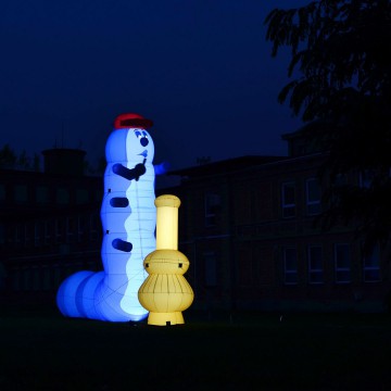 Inflatable caterpillar with internal LED lighting.